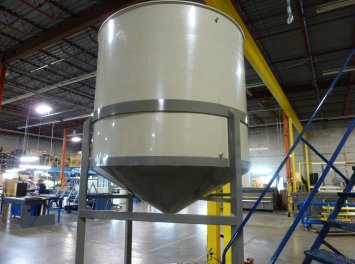 Cylindrical vertical cone bottom tank